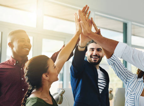 Employees high fiving