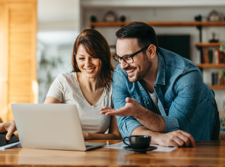 Couple looking at laptop