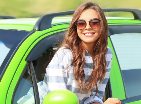 girl in green car