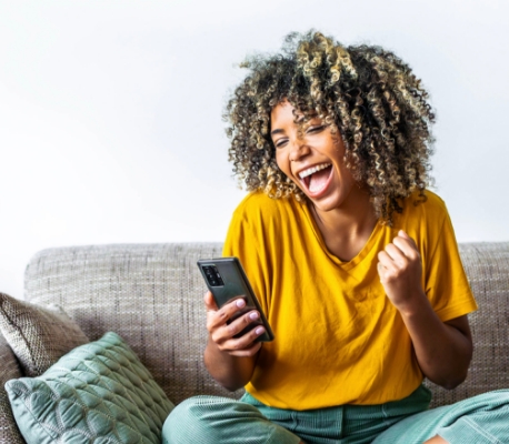 woman excited about text she received